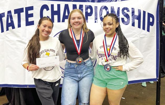 Lady Buck powerlifters, pictured here from left to right, Mia Morris, Madalyn Warren, and Enyssa Fierro all made their mark at the State competition earlier this month. Courtesy photo