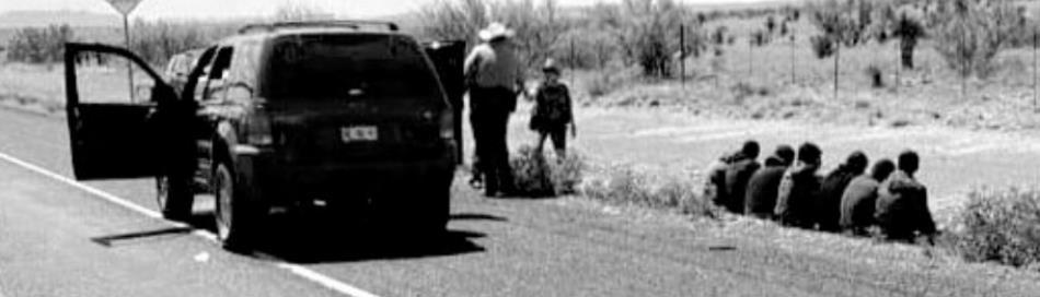 Undocumented individuals await transfer to the Border Patrol after a high-speed chase in Marfa on Saturday. Courtesy photo