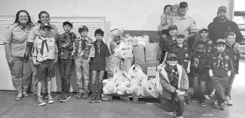 Cub Scout Pack 141 recently collected 481 pounds of food and donated it to the Alpine Food Pantry. Courtesy photo