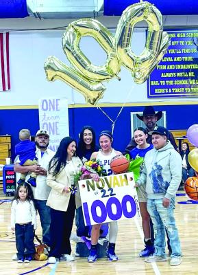 Novah Carrasco hit a milestone, her senior year at Alpine High School, when she hit a career high 1,000 points mark in basketball. Carrasco celebrated this honor with her family on Senior Night last Tuesday when the Lady Bucks defeated the Tornillo Coyotes. Courtesy photo